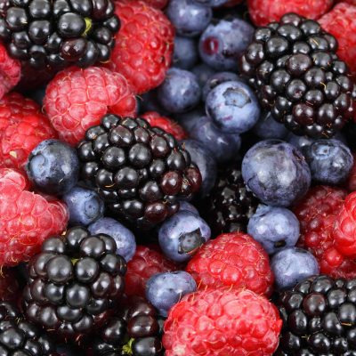 Close-up of blueberries, rasberries, and blackberries.